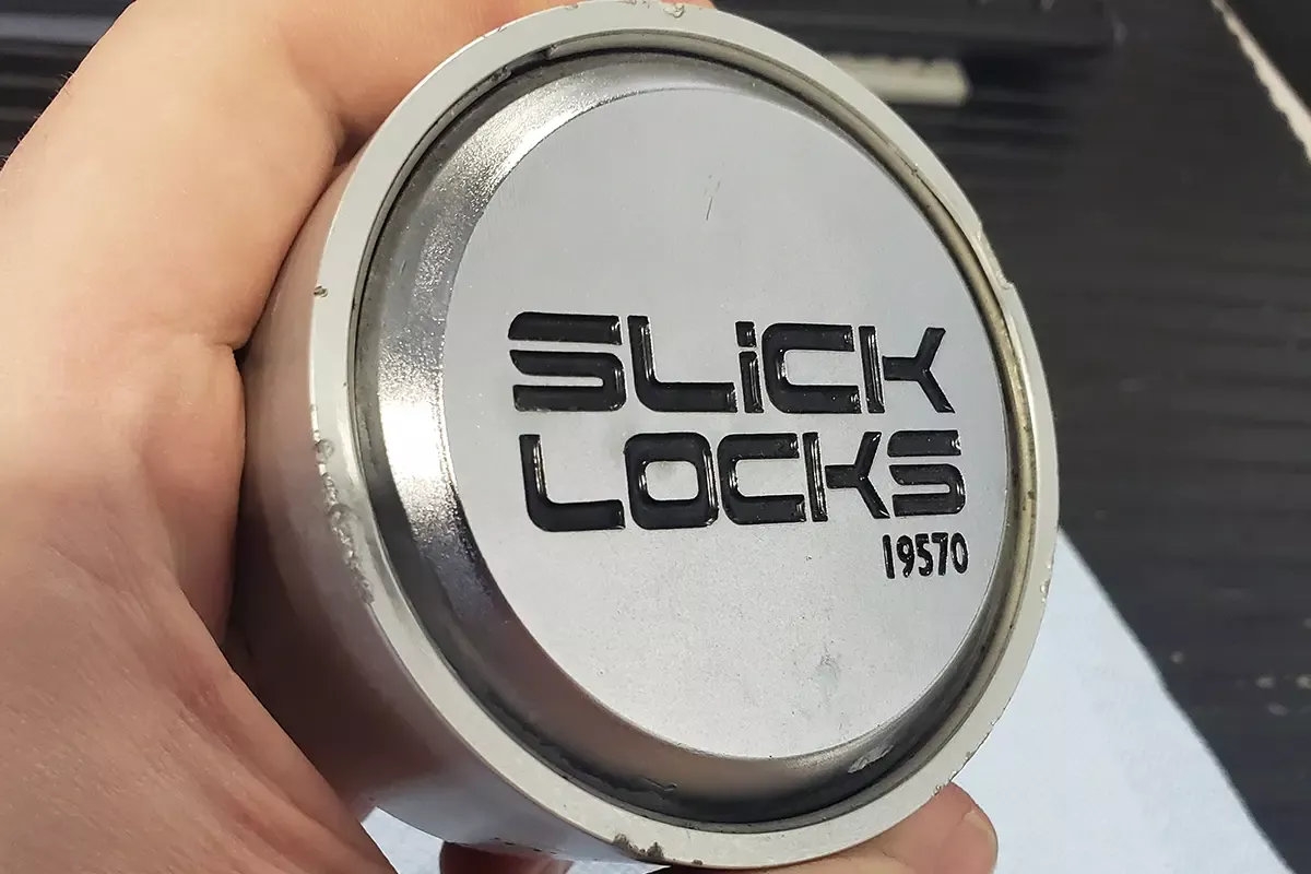 Black cat lock and key - Calgary Puck Lock Installation Services